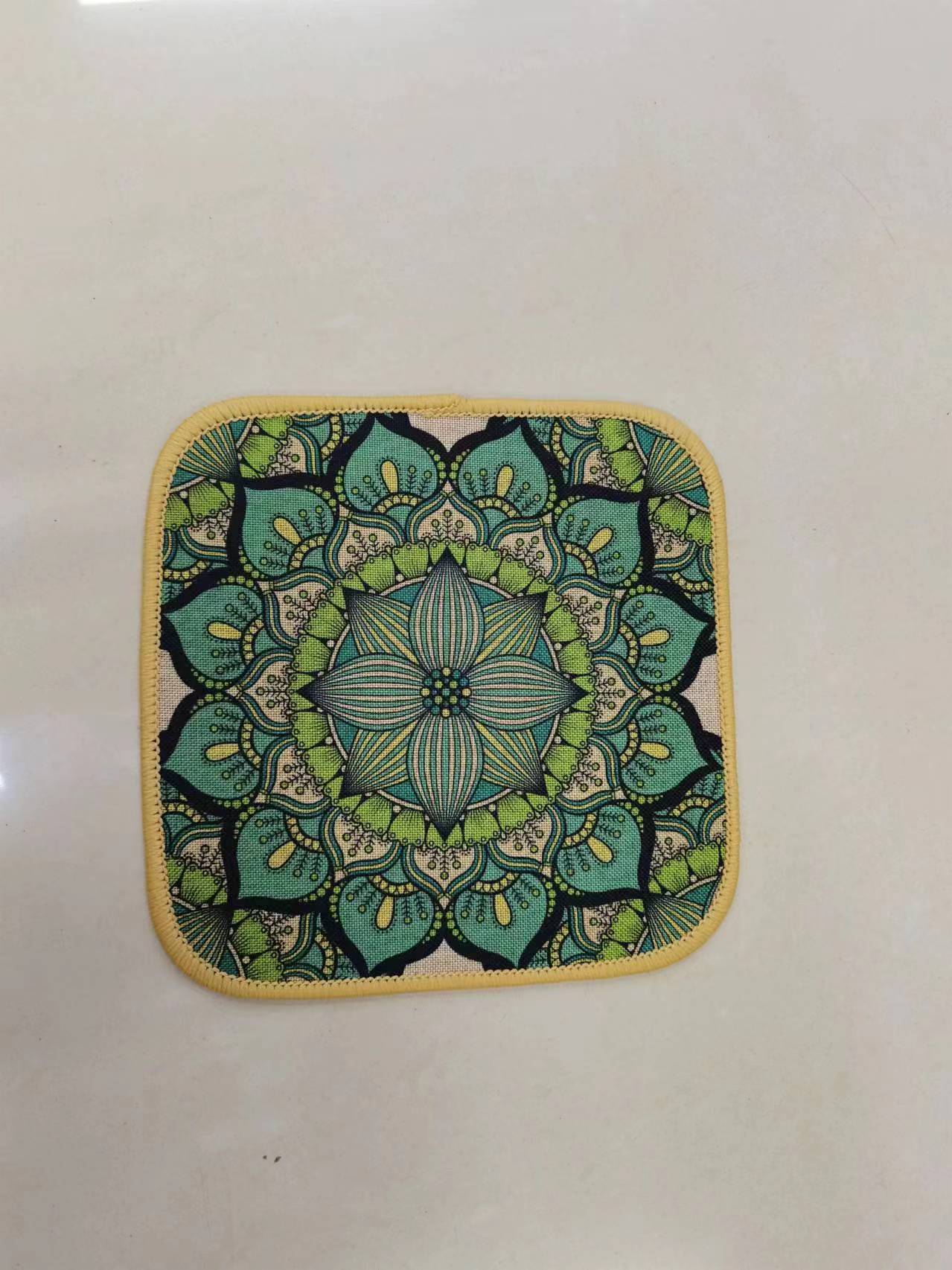 The new square ins linen printed tablecloth, fine linen printed absorbent anti-slip mat, coaster, mouse pad and bowl pad come in multiple patterns and styles. They feature a Bohemian style with a rubber base and clear printing. The size is 18*18cm Item Picture