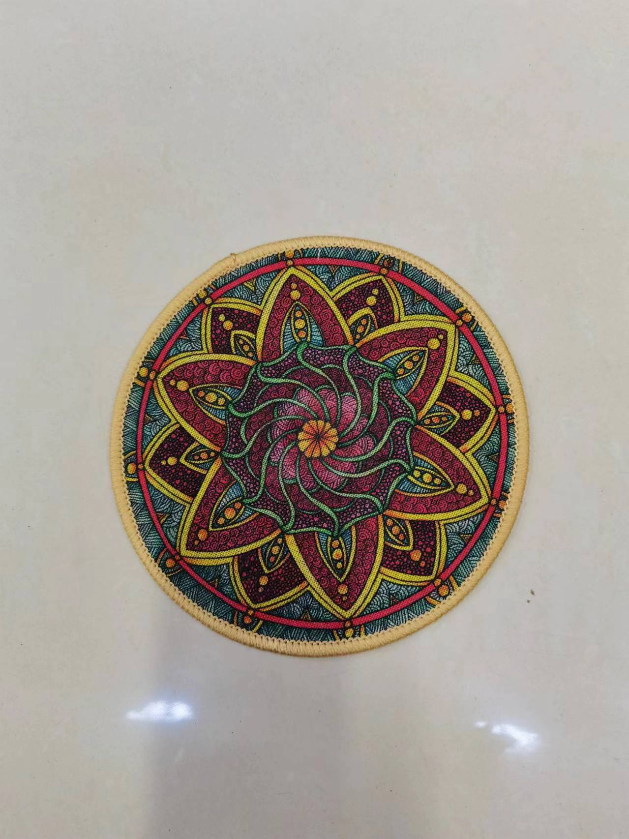 The new round ins linen printed placenta, fine linen printed absorbent anti-slip mat, coaster, mouse pad and bowl pad come in multiple patterns and styles. They feature a Bohemian style with a rubber base and clear printing. The size is 20*20cm Item Picture