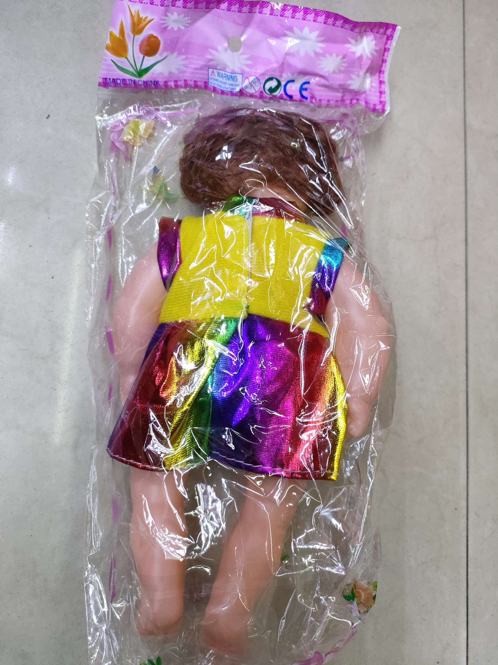 12寸弯脚喷目女娃，彩虹裙，3.25/个，240个/箱。衣服混装。产品图