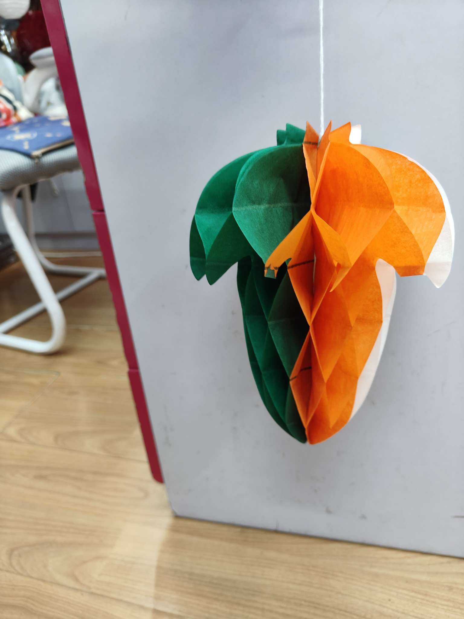 Custom-made irregular-shaped decorative items in the orange, white and green colors of the Indian flag Custom-made irregular-shaped decorative items in the orange, white and green colors of the Indian flag