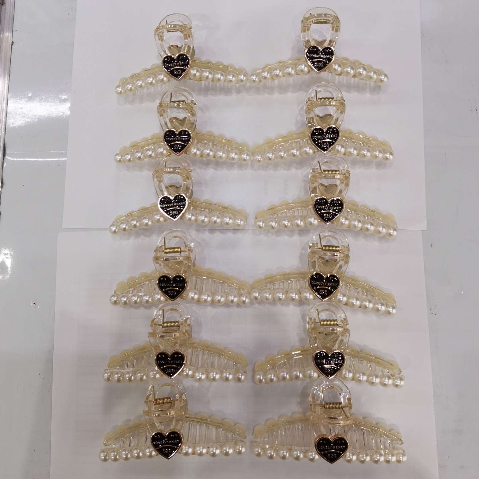 13 cm online bestseller, high-end Chanel series, the same style as Internet celebrities, transparent champagne pearl crossed back of the head, Korean shark hairpin, stylish plastic headwear detail image 3