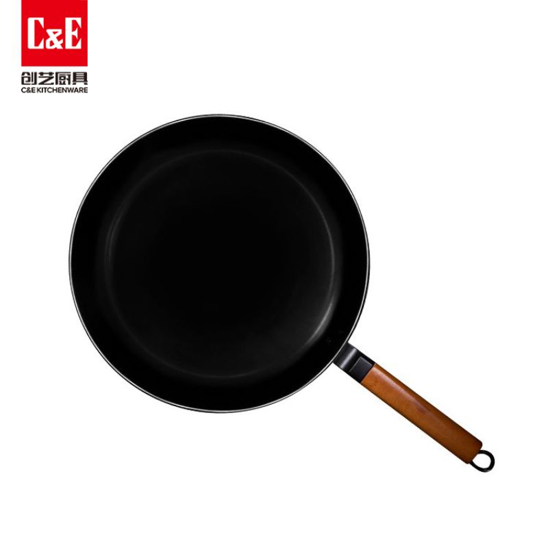 A new household wok from C&E Creative Kitchenware in Yiwu, made of precision cast iron without coating and non-stick for cooking Application Scenario