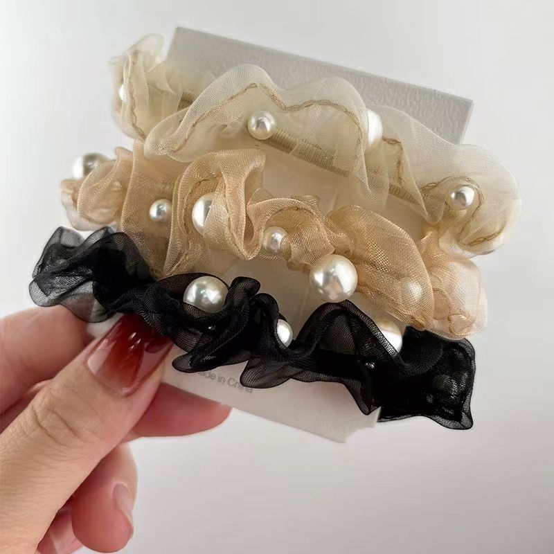 The beaded small intestine hair tie is a French style hair tie for women with high elasticity