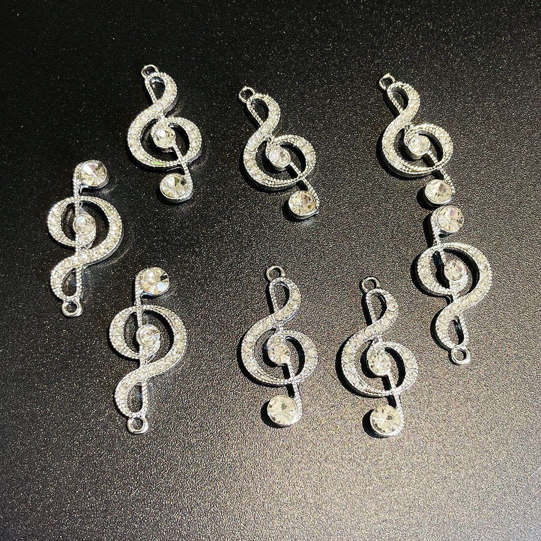 diy handcrafted jewelry pendants made of water diamond musical note materials, earrings, pendants and other handcrafted accessories