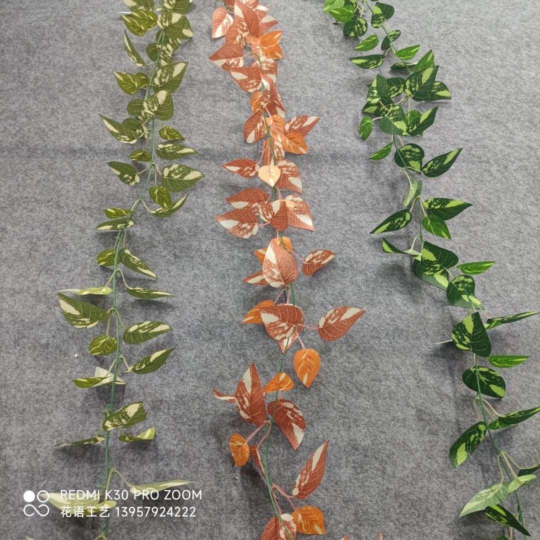 Artificial climbing ivy plants, grape green leaves, plastic artificial flowers, water pipes, and wrapped vines for ceiling decoration details Picture