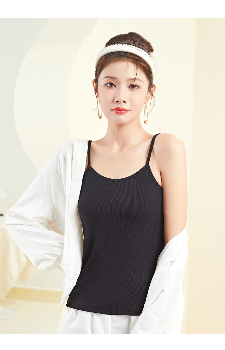 A plus-size women's halter top with a threaded V-neck and a slimming design. It is a white spring and summer base layer made of cotton pic 32