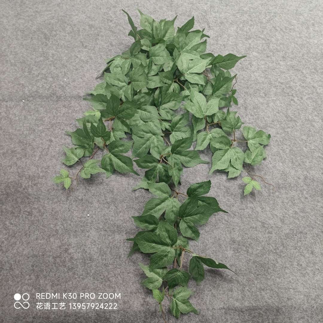 Artificial climbing ivy plants, grape green leaves, plastic artificial flowers, water pipes, and wrapped vines for ceiling decoration Application Scenario