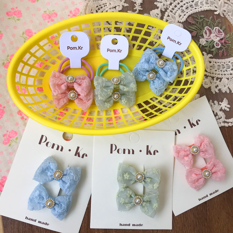 New bow fabric hair clips, children's fashionable and versatile fabric embroidered hair clips, hair bands, small rubber bands, hair ties and hair accessories Application Scenario