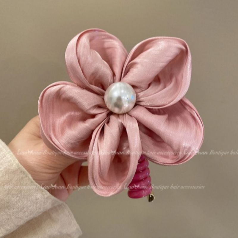 Summer beach-style large flower, colorful straight telephone line hair tie, ponytail hair tie, women's 2024 new high-end leather band hair tie and hair tie Application Scenario