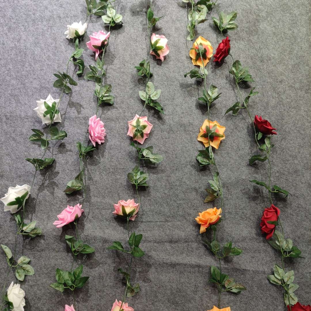 Artificial rose vines, artificial flower vines, air conditioning pipes blocking the living room ceiling decoration, plastic vines entwining plants details Picture