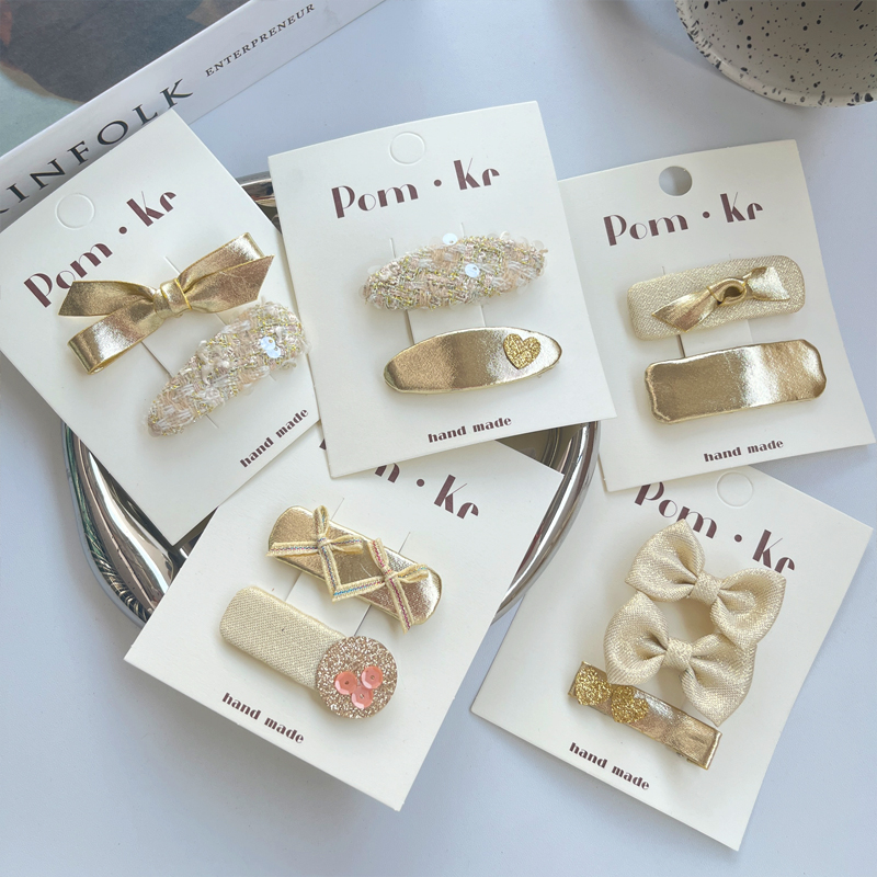 新款金色爱心亮片蝴蝶结发夹儿童时尚百搭鸭嘴夹侧边刘海碎发发卡图