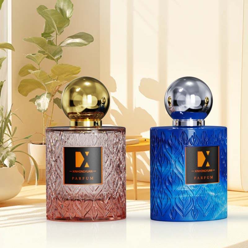 Factory direct sales 100ml perfume bottle, cylindrical bottle body, labeled and color-sprayed bottle bottom, thickened glass bottle, empty bottle details Picture