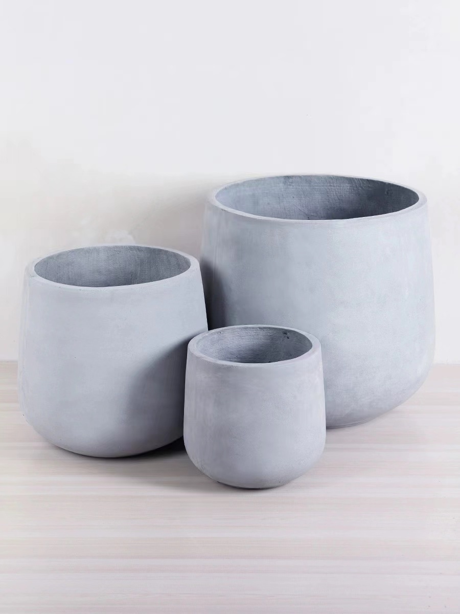 Magnesium clay flower POTS for export in black, white and gray, simple, artistic and personalized flower POTS, green ivy and cactus flower POTS details Picture