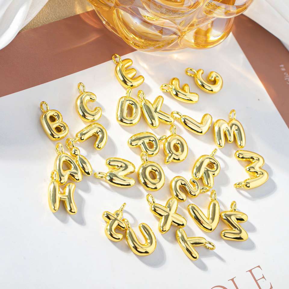 European and American fashion style cross-border jewelry accessory copper necklace plated with 18K gold and 26 English letters details Picture