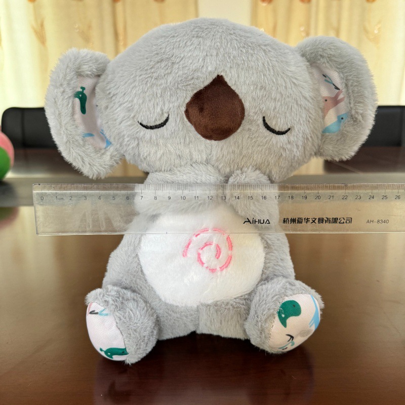 A new cross-border plush toy that breathes, glows and makes sounds, featuring a cute koala breathing bear and a baby lullabing music for early education detail image 3