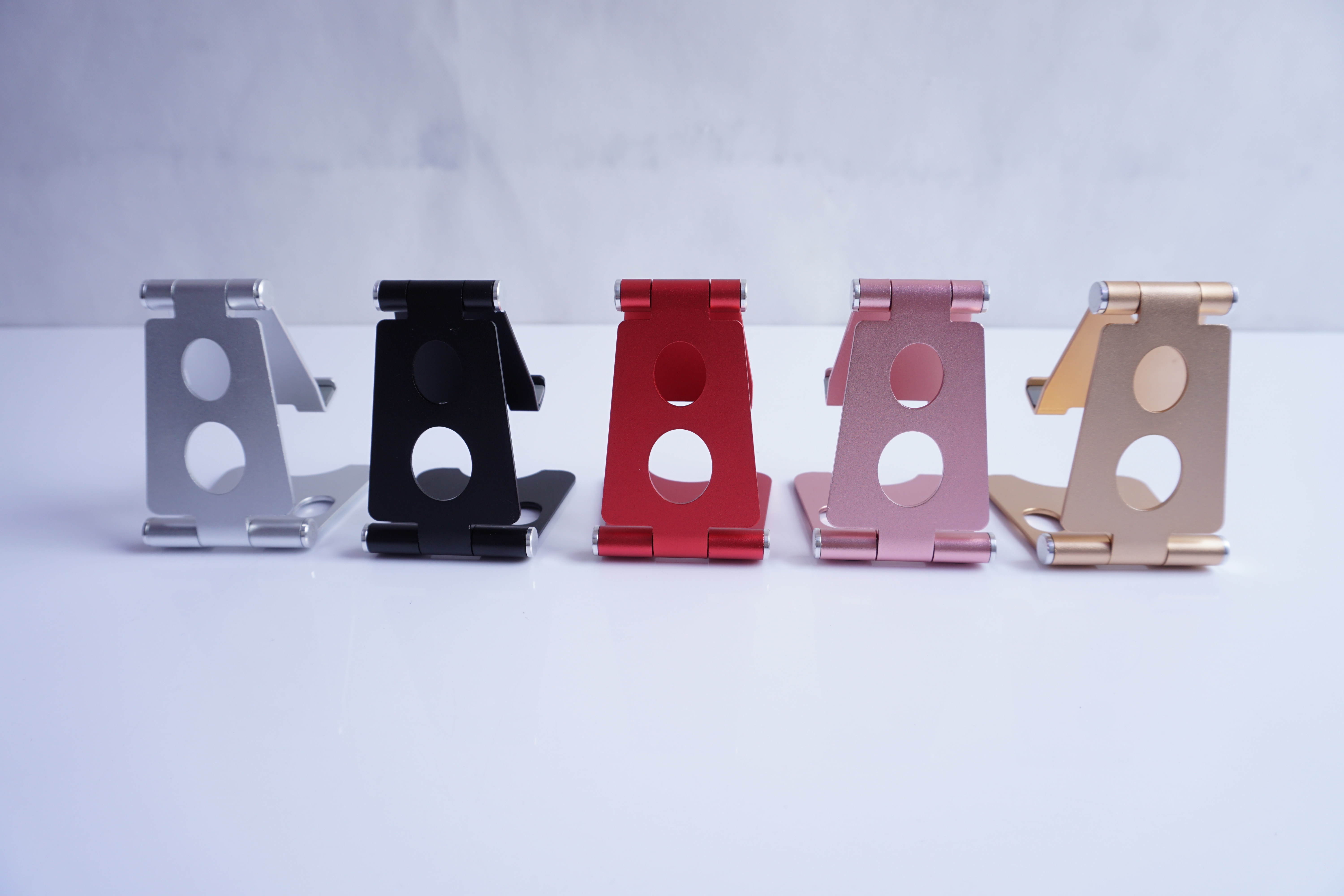 Double folding phone stand, small size, dual rotating shafts adjustable, small size can be folded and stored
