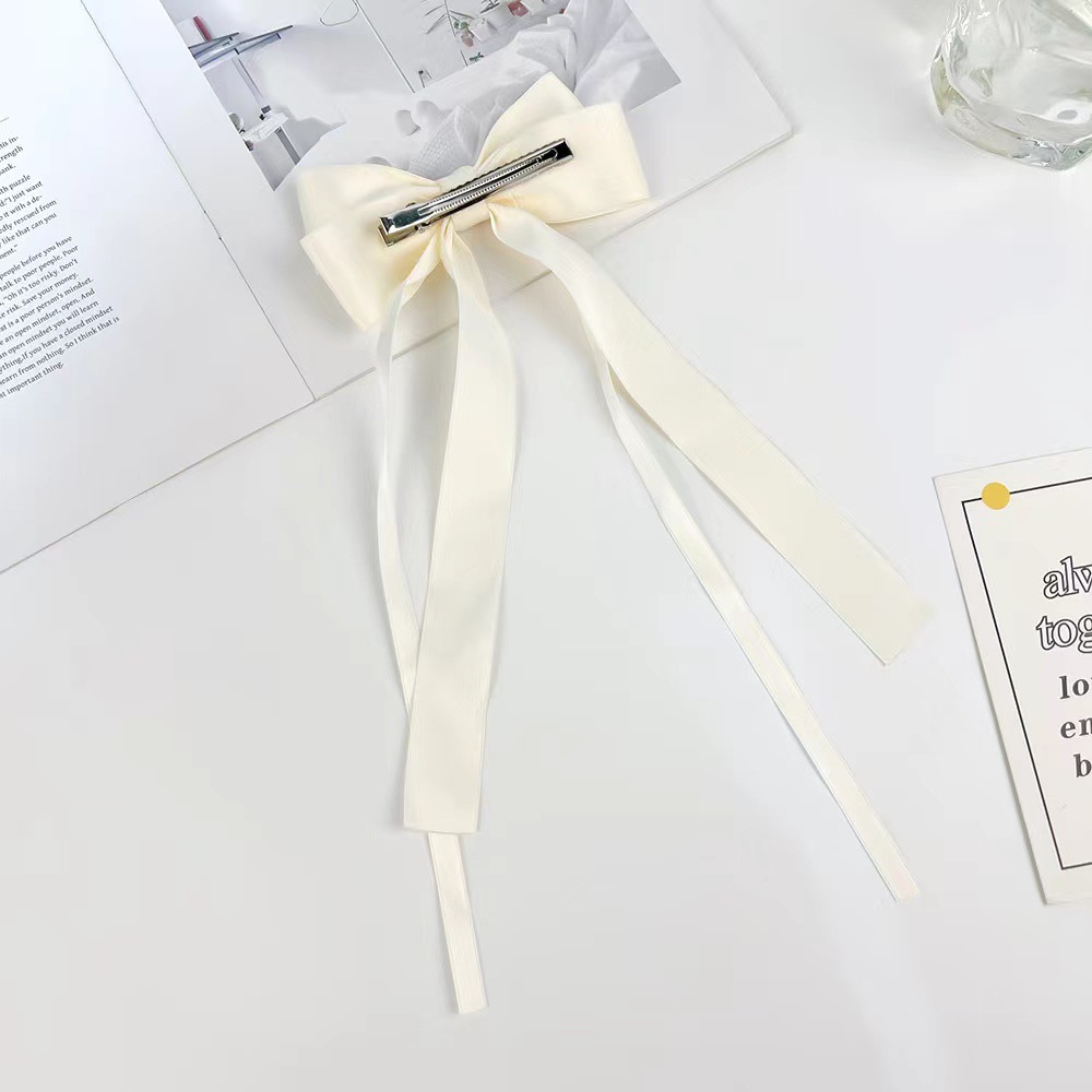 Creative accessories for foreign trade: duckbill clips, hair accessories, and head accessories with an integrated design. Simple and fashionable. 50 pieces of large bow hair clips with ribbons per pack Specification image