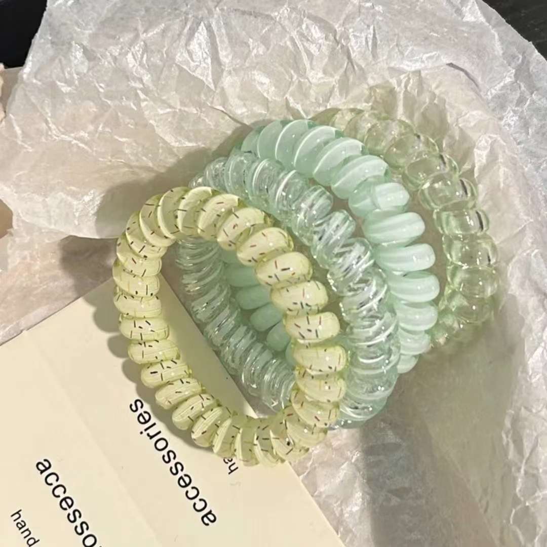 A set of mixed high-elasticity and thickened wristbands for tying hair, a stylish hair accessory, and mixed color headwear Application Scenario