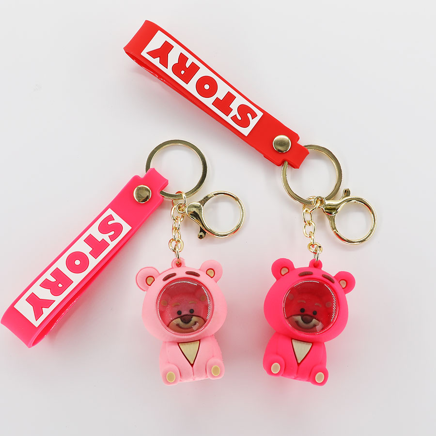 Wholesale of popular cartoon strawberry bear keychains, space bear figurines, schoolbag decorations, astronaut best friend and couple gifts Specification image