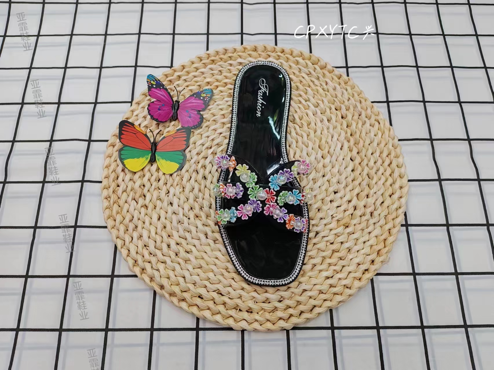 Summer fashion: Wearing cool flip-flops with colorful flowers outside
