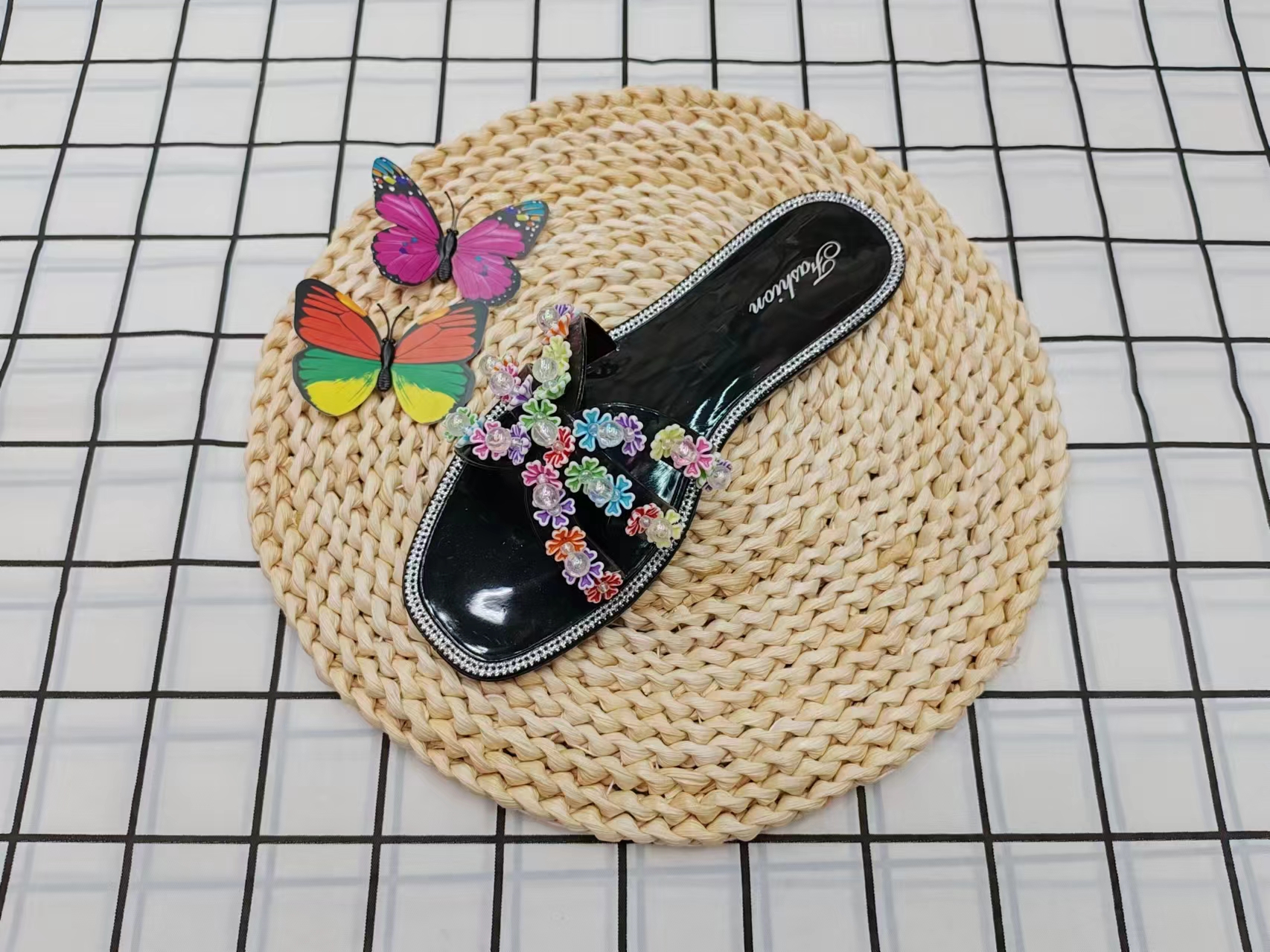 Summer fashion: Wearing cool flip-flops with colorful flowers outside Specification image