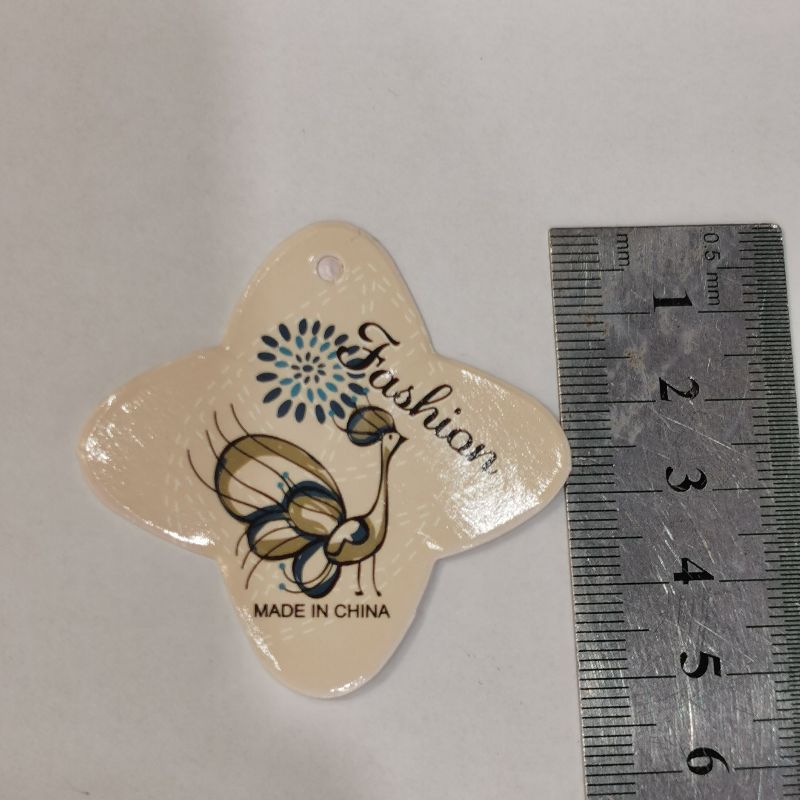 Peacock pattern clothing tags, custom-made clothing tags, custom-made tag cards, custom-made underwear tags, custom-made clothing labels details Picture