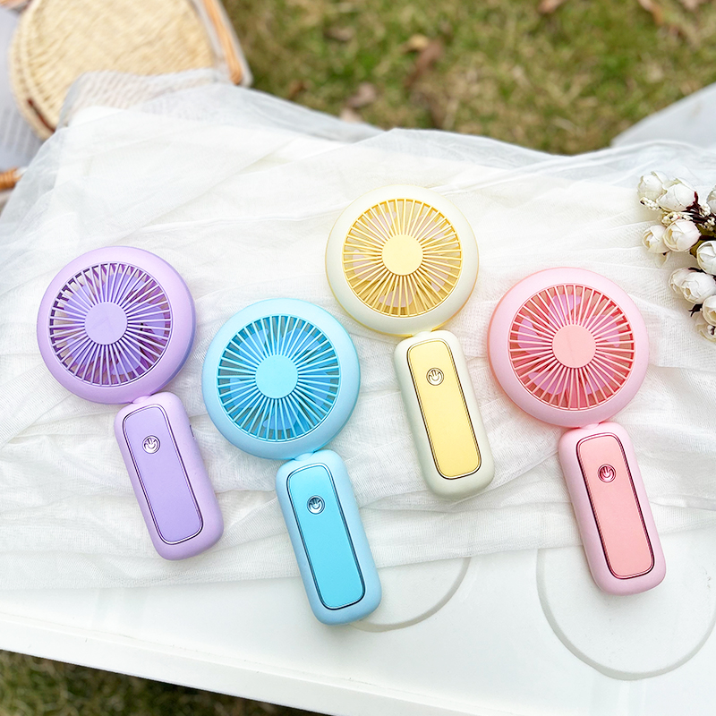 A vertical, convenient, simple and foldable three-speed small fan with a light