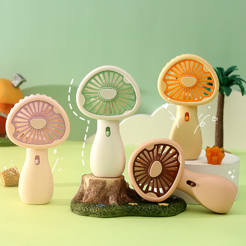 Mini fan, USB charging fan, upright, convenient, simple and cute mushroom handheld small fan details Picture