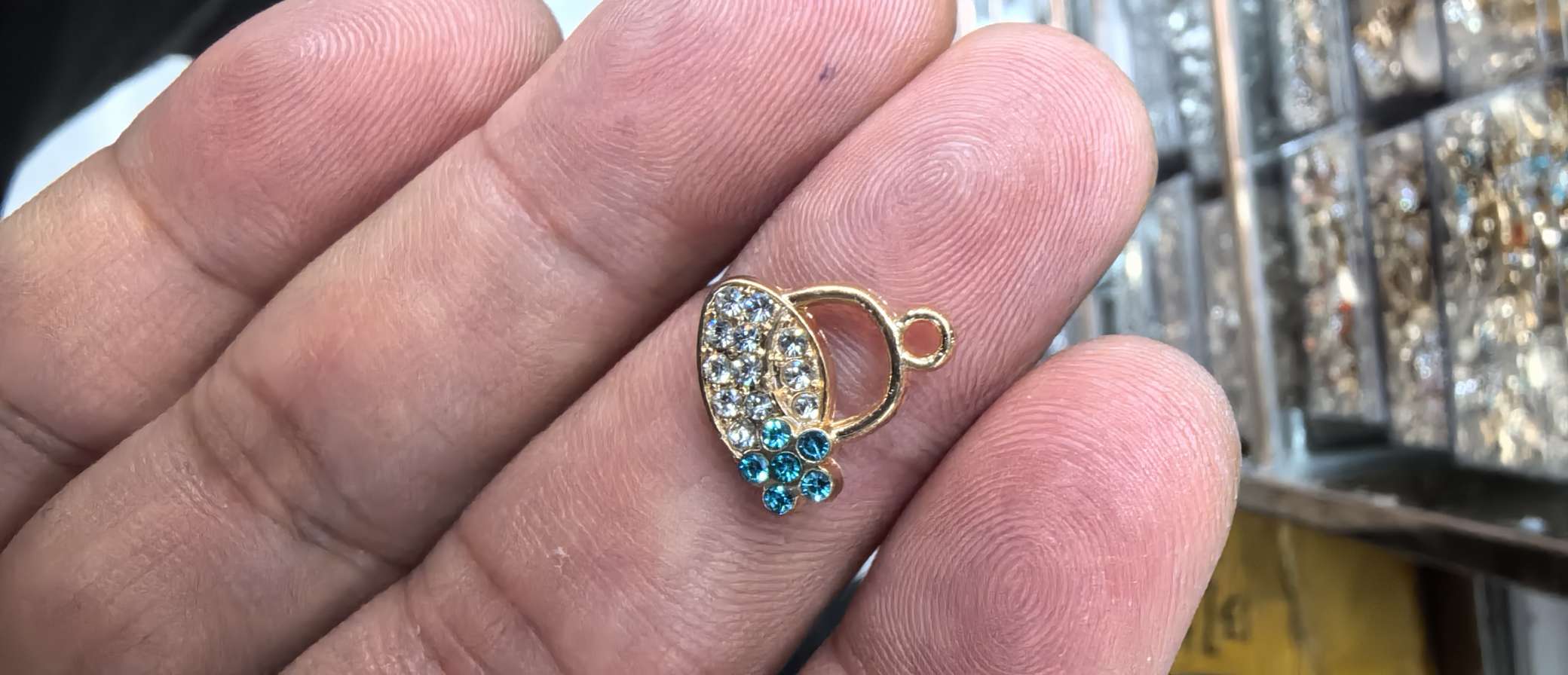 A small blue diamond-dotted small bag