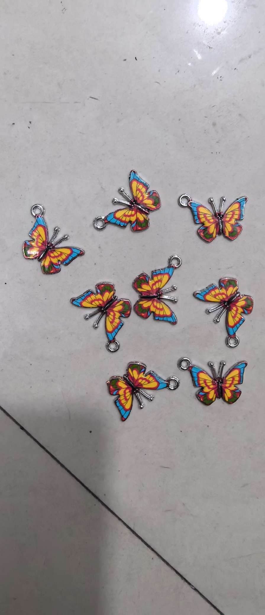 Gradient butterfly pendant