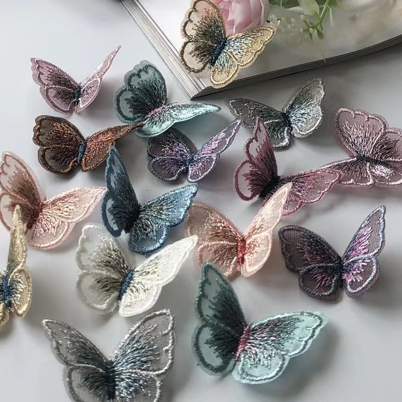 小蝴蝶刺绣布欧根纱贴绣花时尚头饰衣服装饰辅料手工缝白底实物图