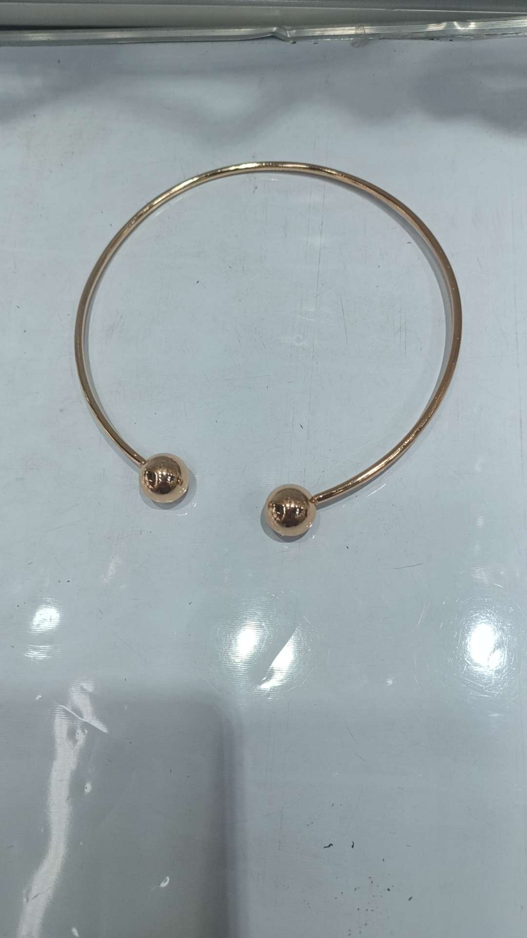 A golden exaggerated collar