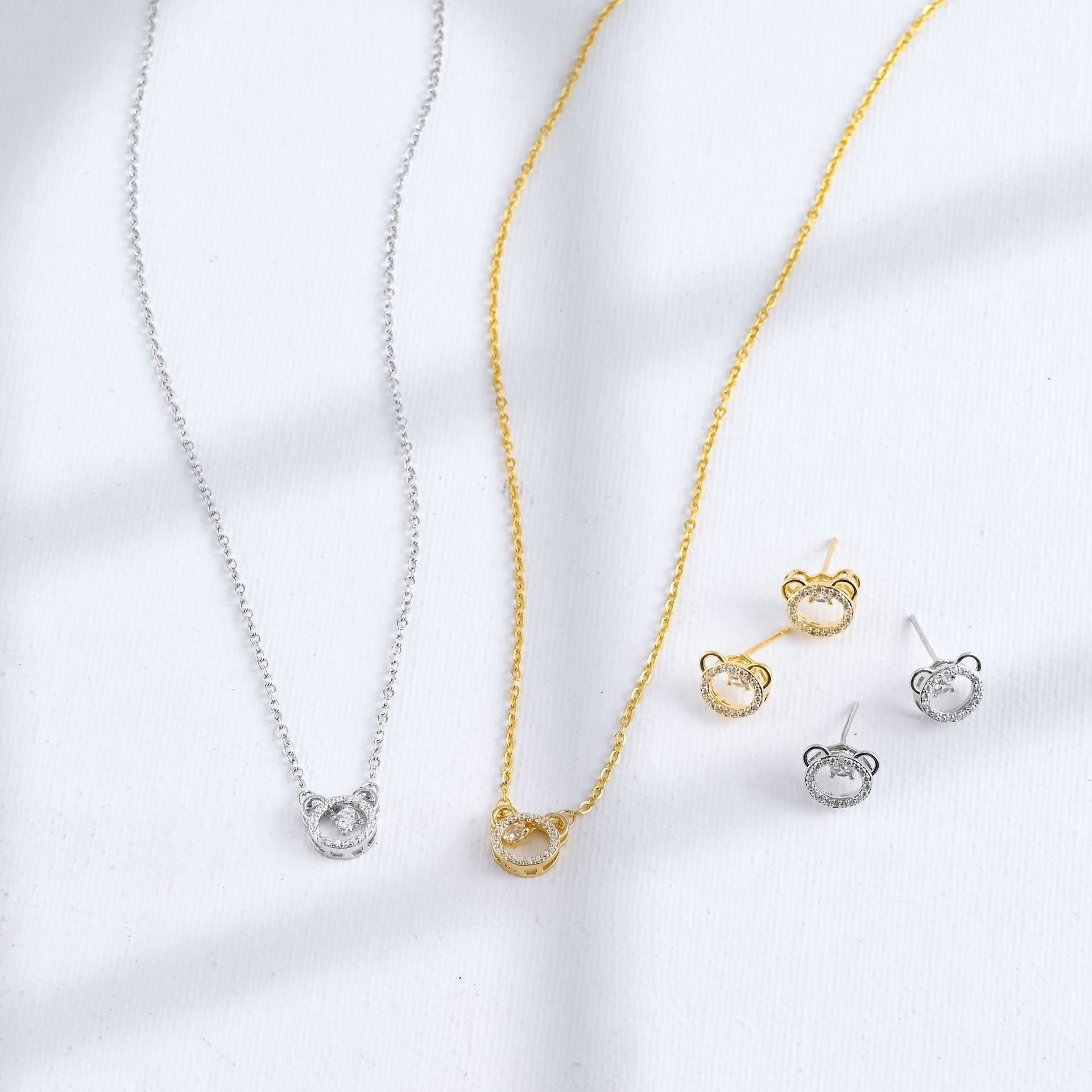 Xuhui brand exquisite and light luxury copper plated with real gold and zirconia 925 silver needle luxurious bear stud necklace set full figure