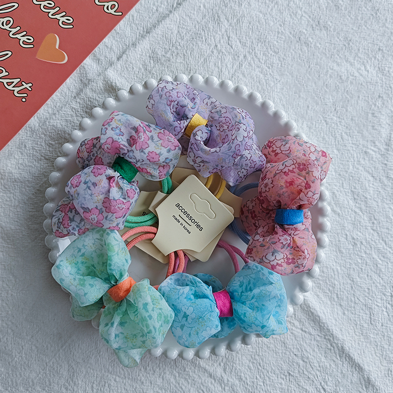 The new Korean-style pastoral floral bow hair tie is versatile for children, fresh and cute, and won't damage hair. It can be used as a hair tie details Picture