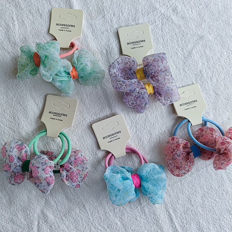 The new Korean-style pastoral floral bow hair tie is versatile for children, fresh and cute, and won't damage hair. It can be used as a hair tie Specification image