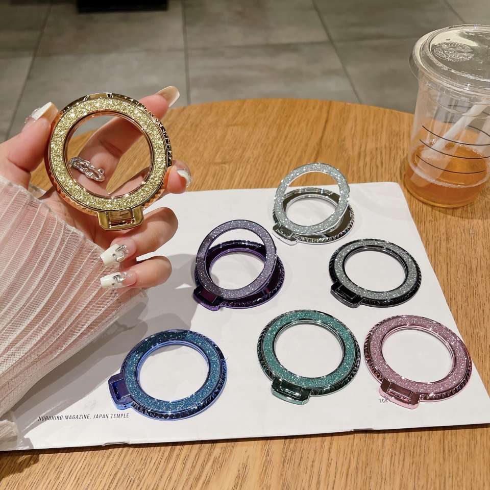 New back sticker diamond-patterned magnetic glitter hollowed-out phone stand, desktop lazy person creative folding wireless charging ring Application Scenario