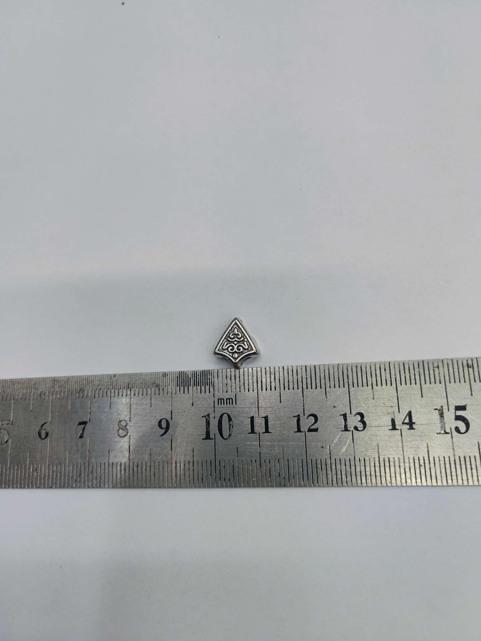 Triangular beads