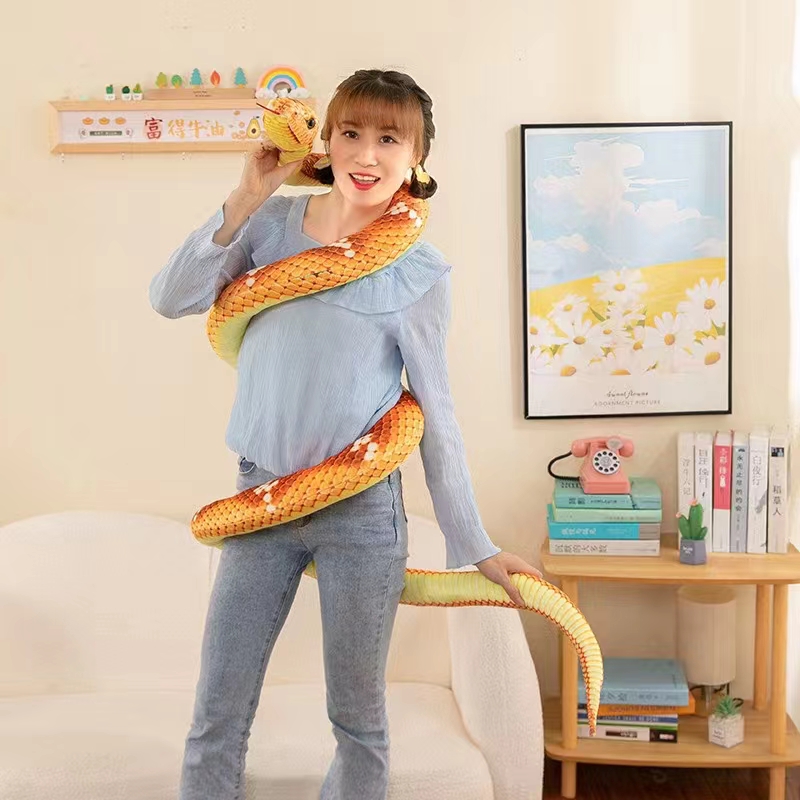 A big python plush toy doll, a funny and mischievous long golden python pillow, a cartoon animal toy that plays tricks on people Specification image