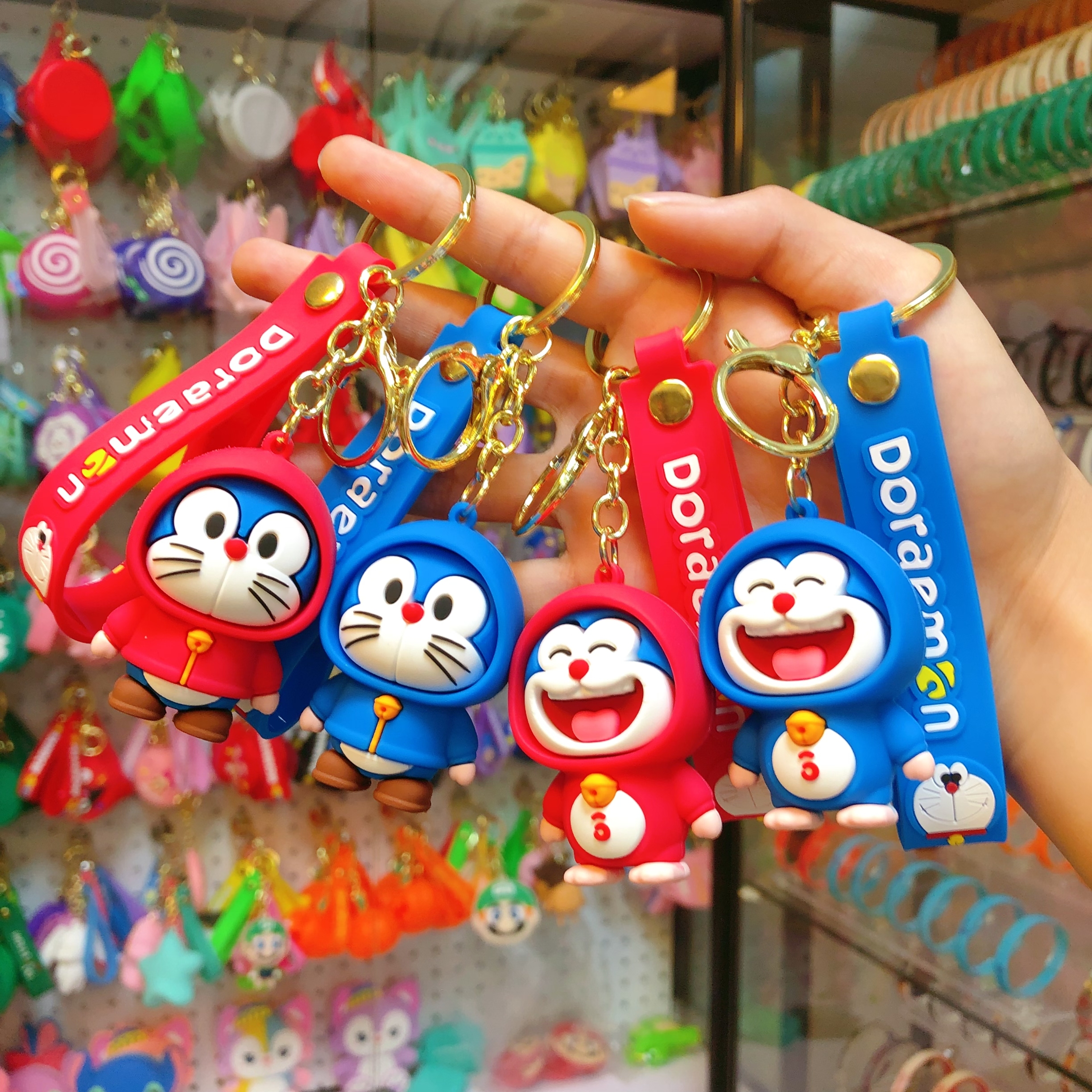 Dibujos animados doraemon llavero lindo lindo gato jingle PVC bolsa colgante llavero del coche regalo al por mayor dibujos animados doraemon llavero lindo gato jingle PVC bolsa colgante llave del coche