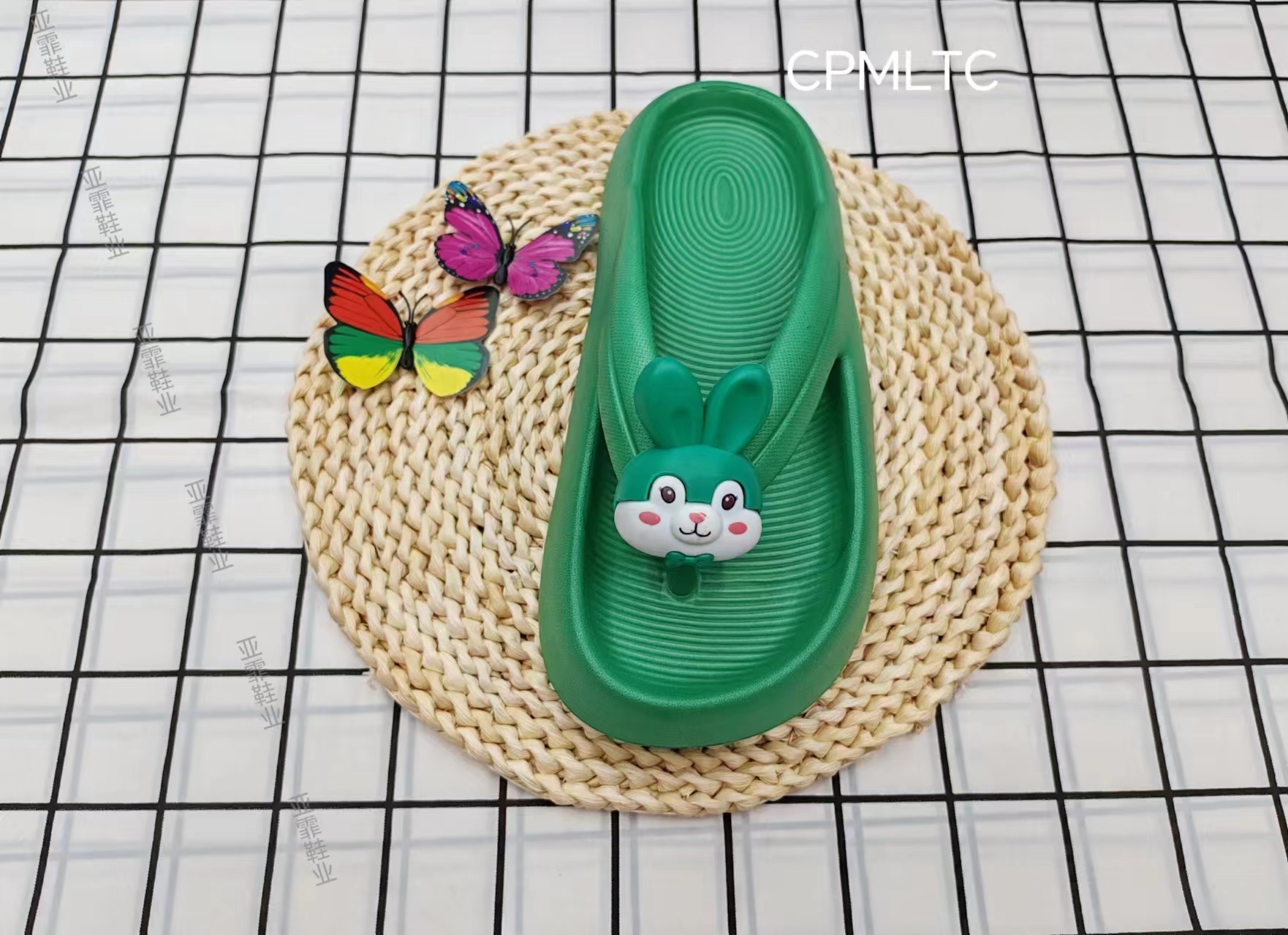 The summer fashion little rabbit wears flip-flops on the outside