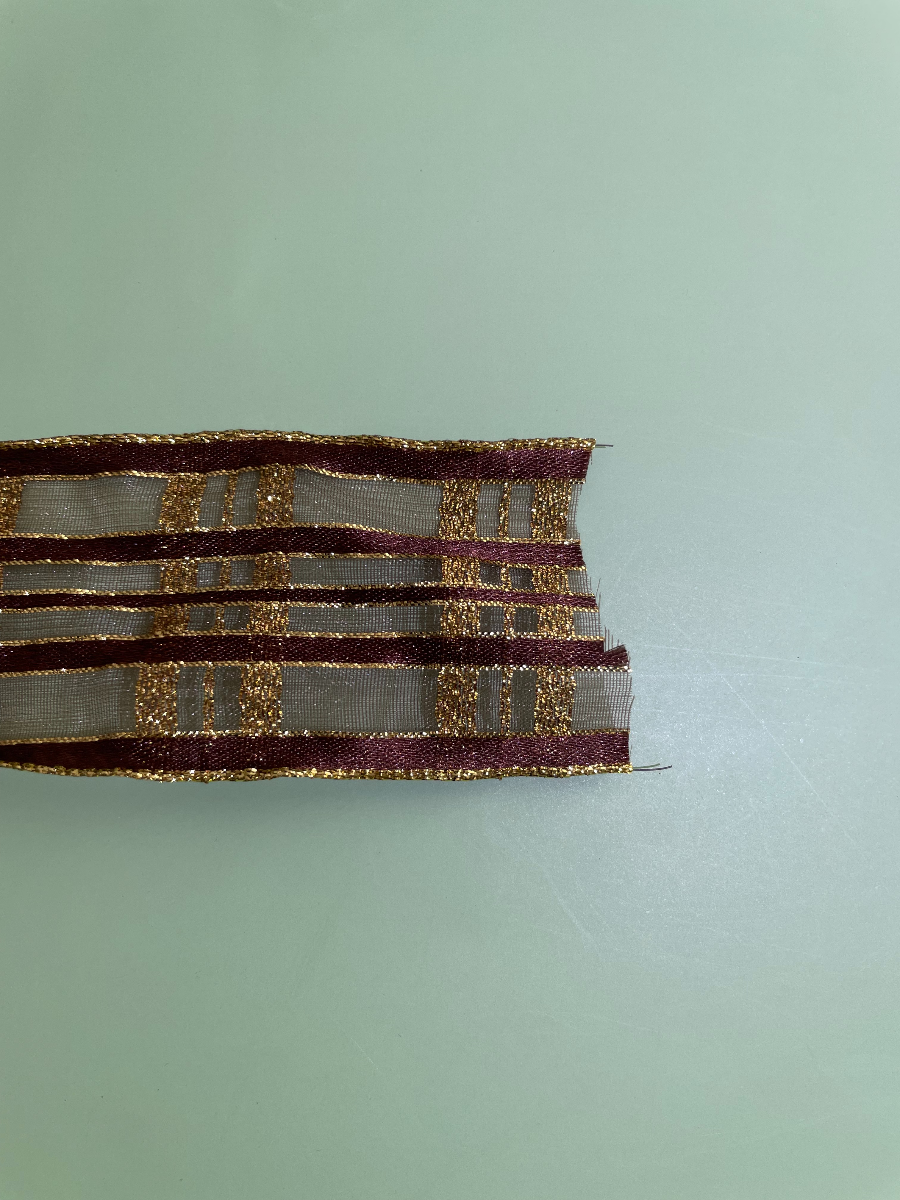 Item No. : HW014-0150-A001 Christmas Supplies Gift Packaging Decoration DIY Christmas Gold Plain Satin Checkered Gauze Ribbon # Red Christmas Webbing 3.8cm Specification image