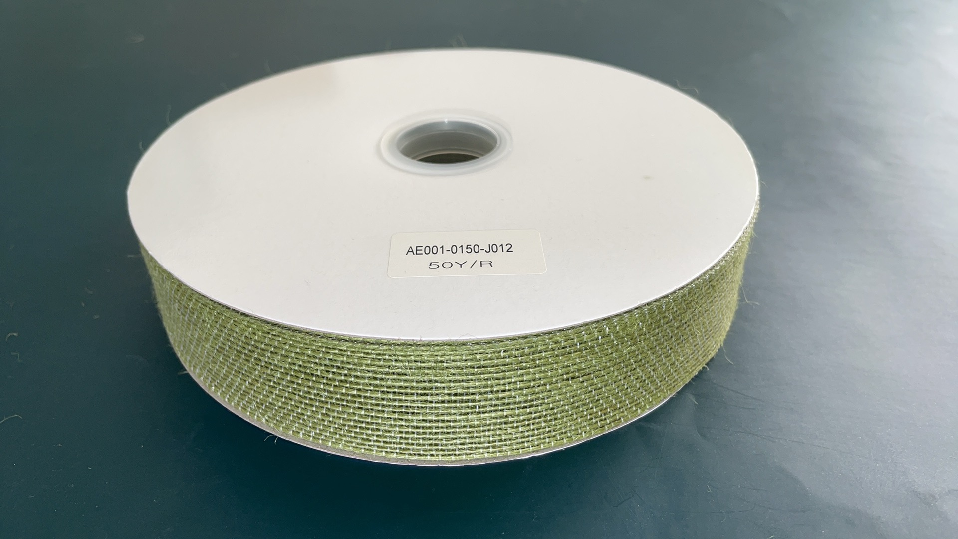 Item No. : AE001-0150-J012 Christmas Gift Packaging Decoration DIY Christmas Grass Green Fish Thread Hemp Tape Christmas Iron Wire Tape 3.8cm Christmas Product Item Picture