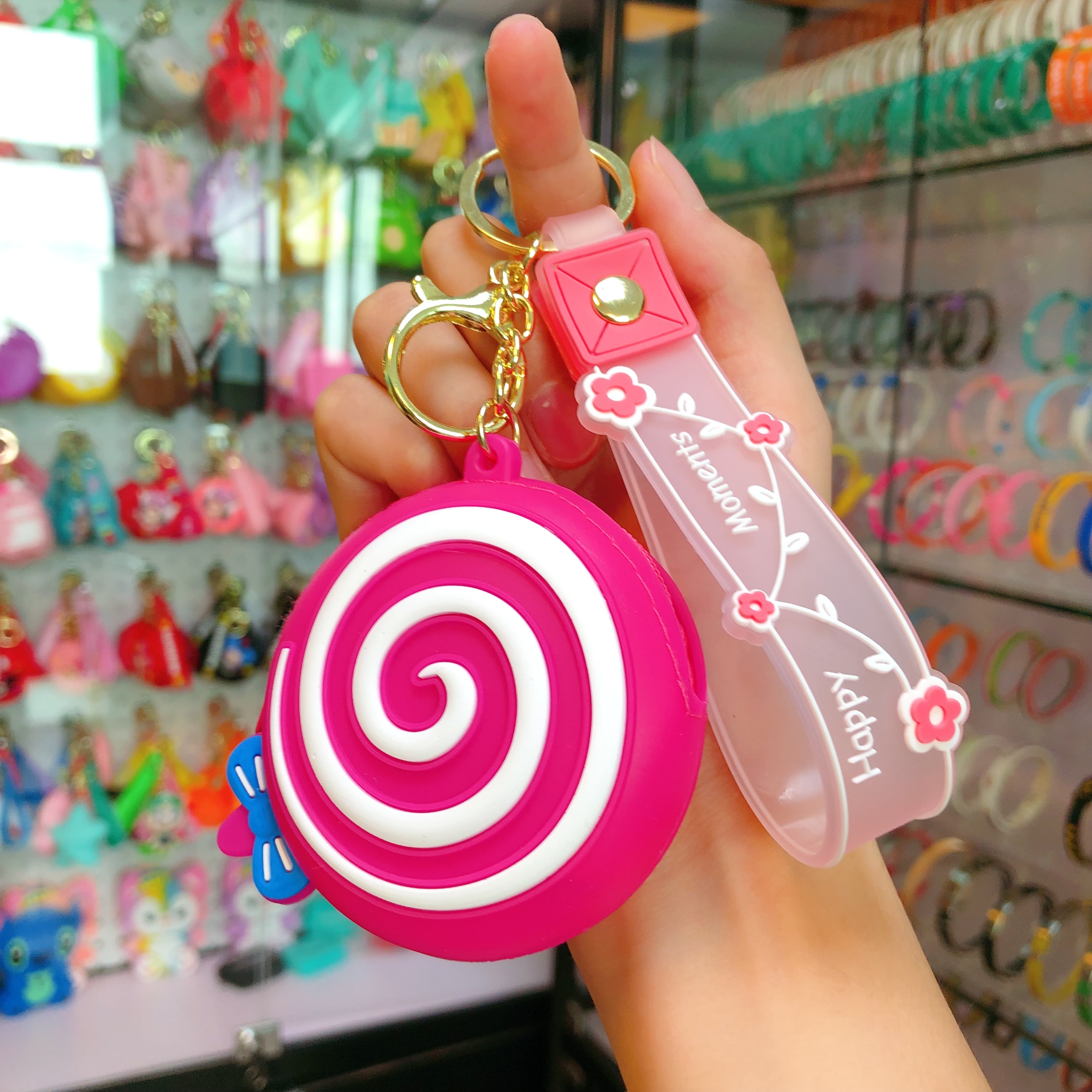 Creative and cute soft rubber lollipop coin purses, keychains, women's earphone storage bags, car pendants, keychains wholesale creative and cute soft rubber lollipop coin purses, keychains, women's earphone storage bags, car pendants, keychains wholesale Item Picture