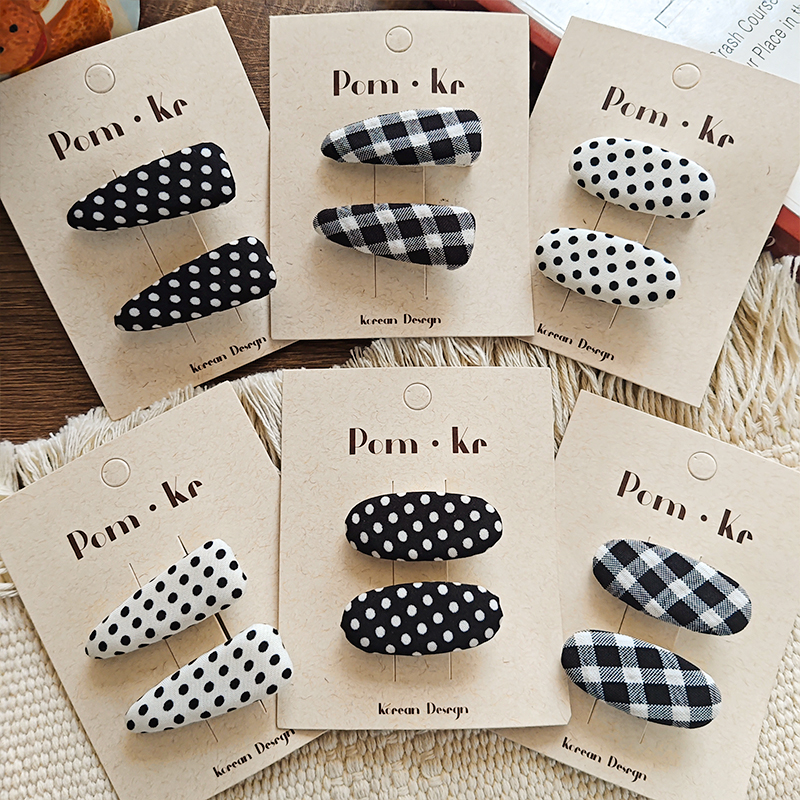 New Korean-style simple black and white polka dot fabric children's versatile and atmospheric girls' bangs clips, bb clips, hair accessories and hair clips Application Scenario
