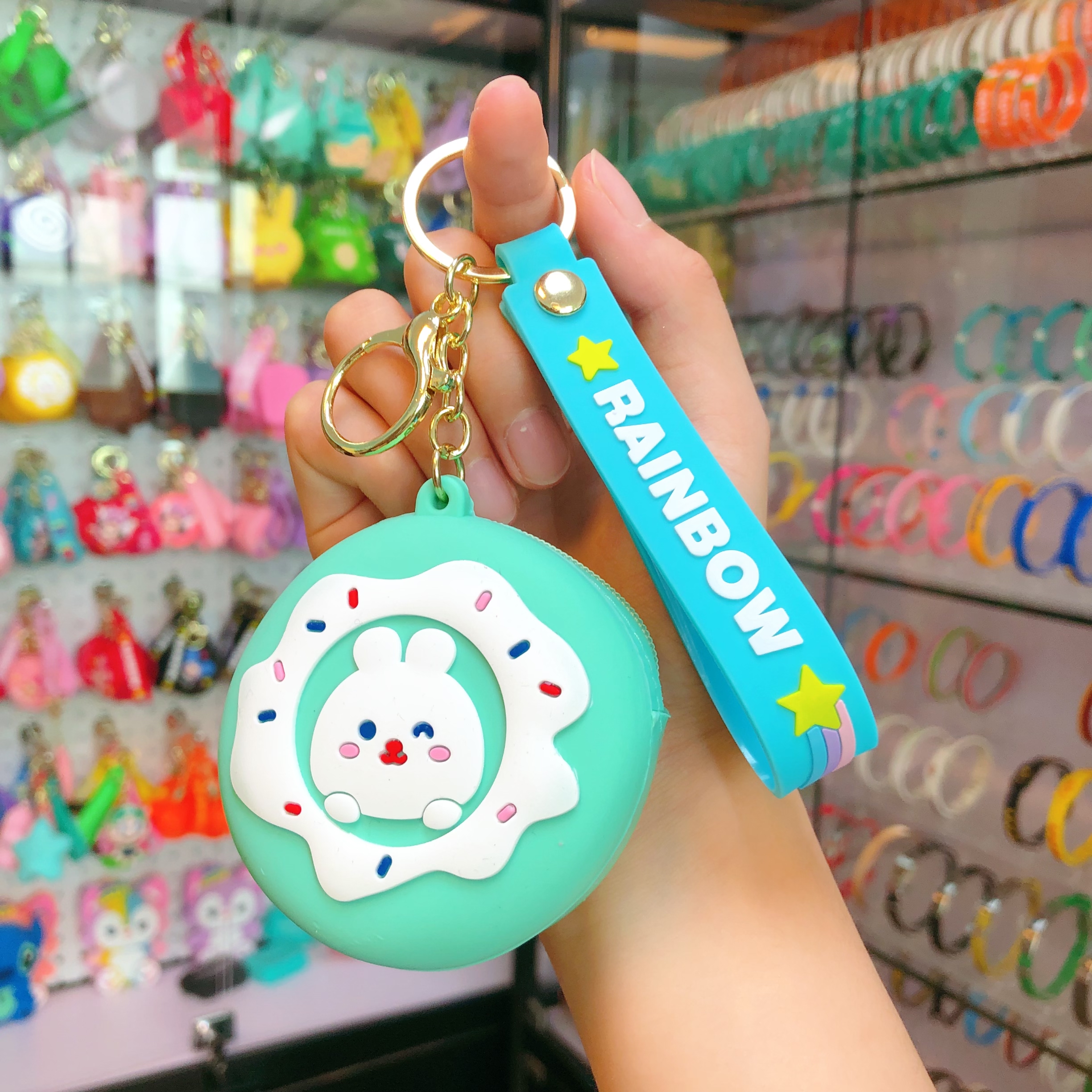 Wholesale of doughnut silicone coin purse pendants, children's mini wallet card cases, student schoolbag pendants, keychains Item Picture