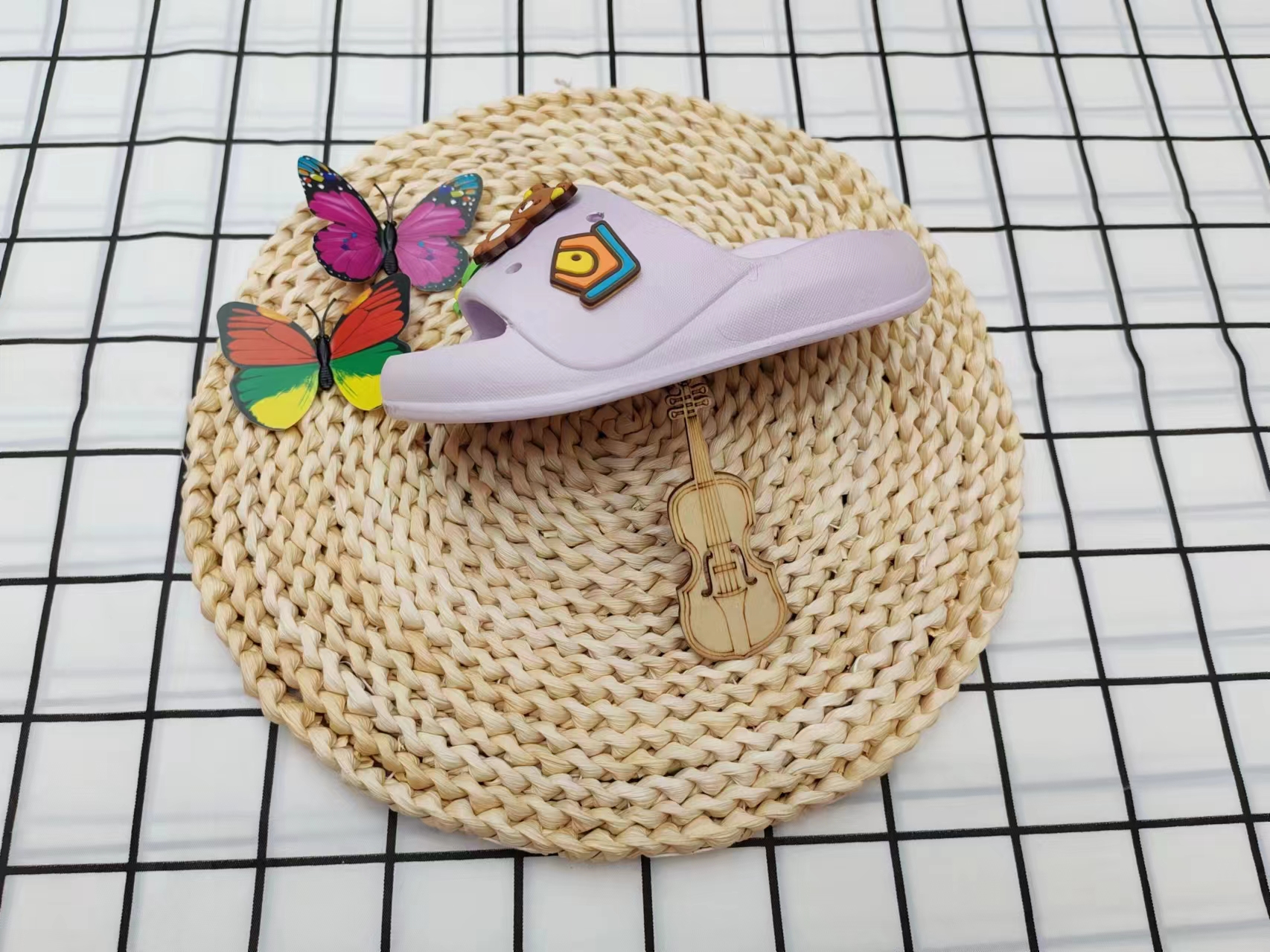 The cute cartoon little bear wears flip-flops outside in summer details Picture
