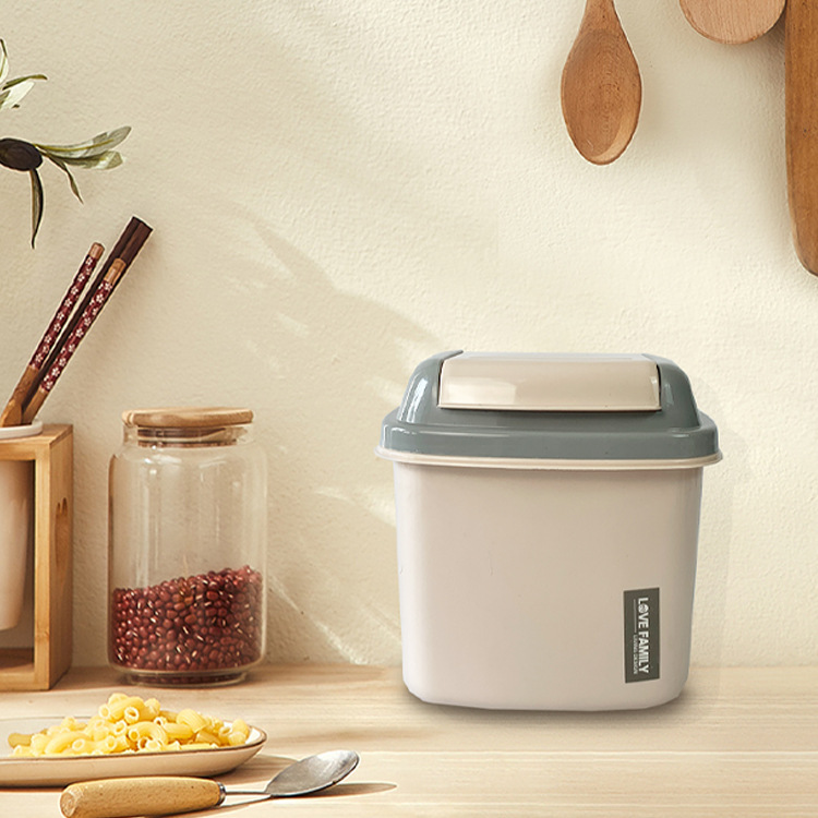 J122-JM9416 desktop flip-top mini trash can, plastic storage bucket, storage bucket, handheld paper basket storage Application Scenario