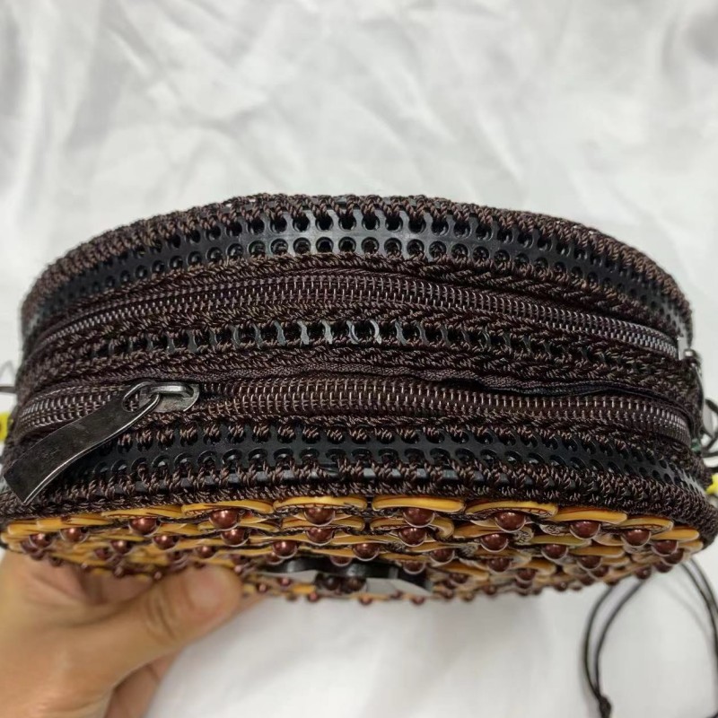 Large round coconut shell handcrafted beaded women's buns with ethnic style characteristics, hollowed-out coconut shell diagonal cross buns in stock Application Scenario