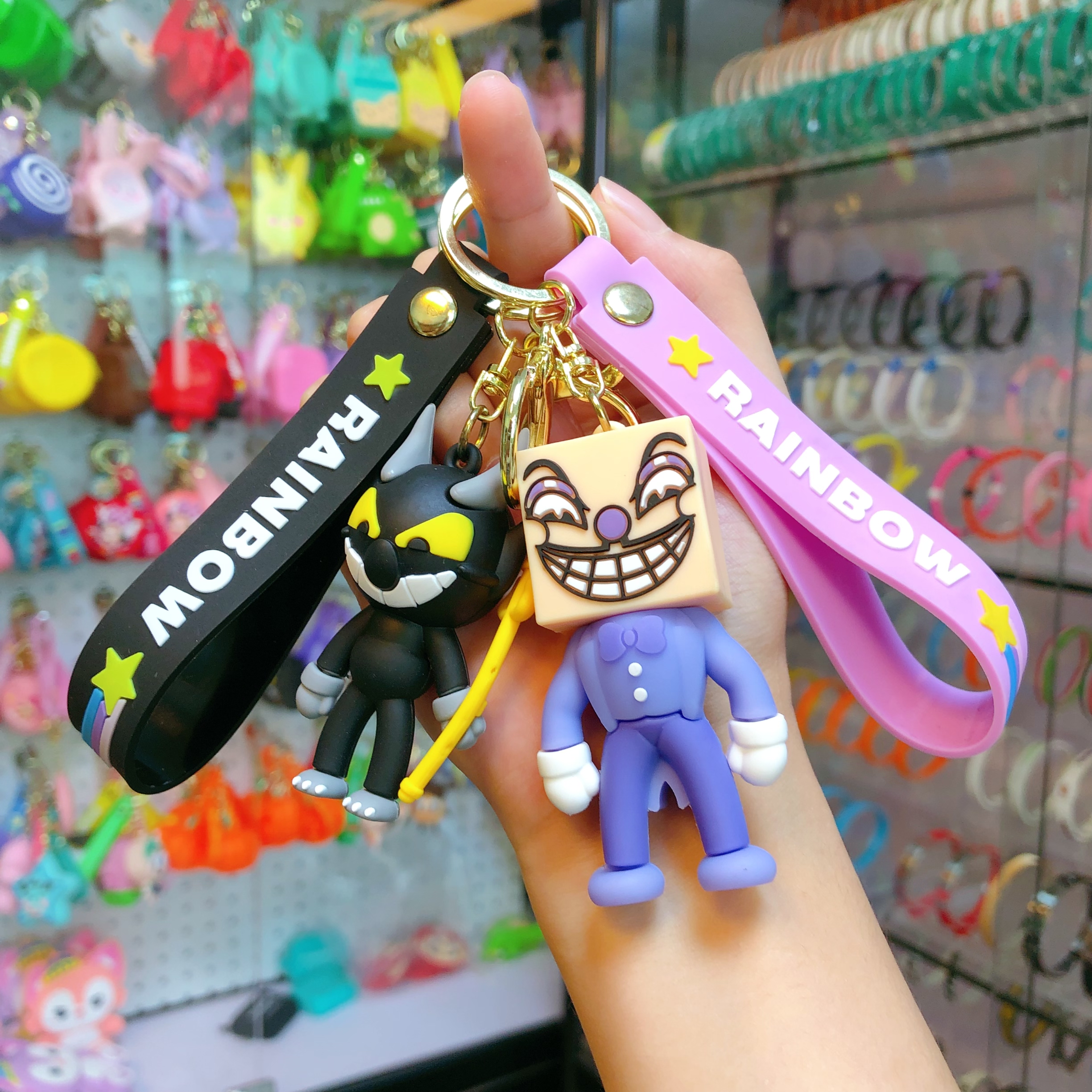Wholesale of soda water figure keychain figurines, popular key chain accessories, pendants, creative and cute car schoolbags Specification image