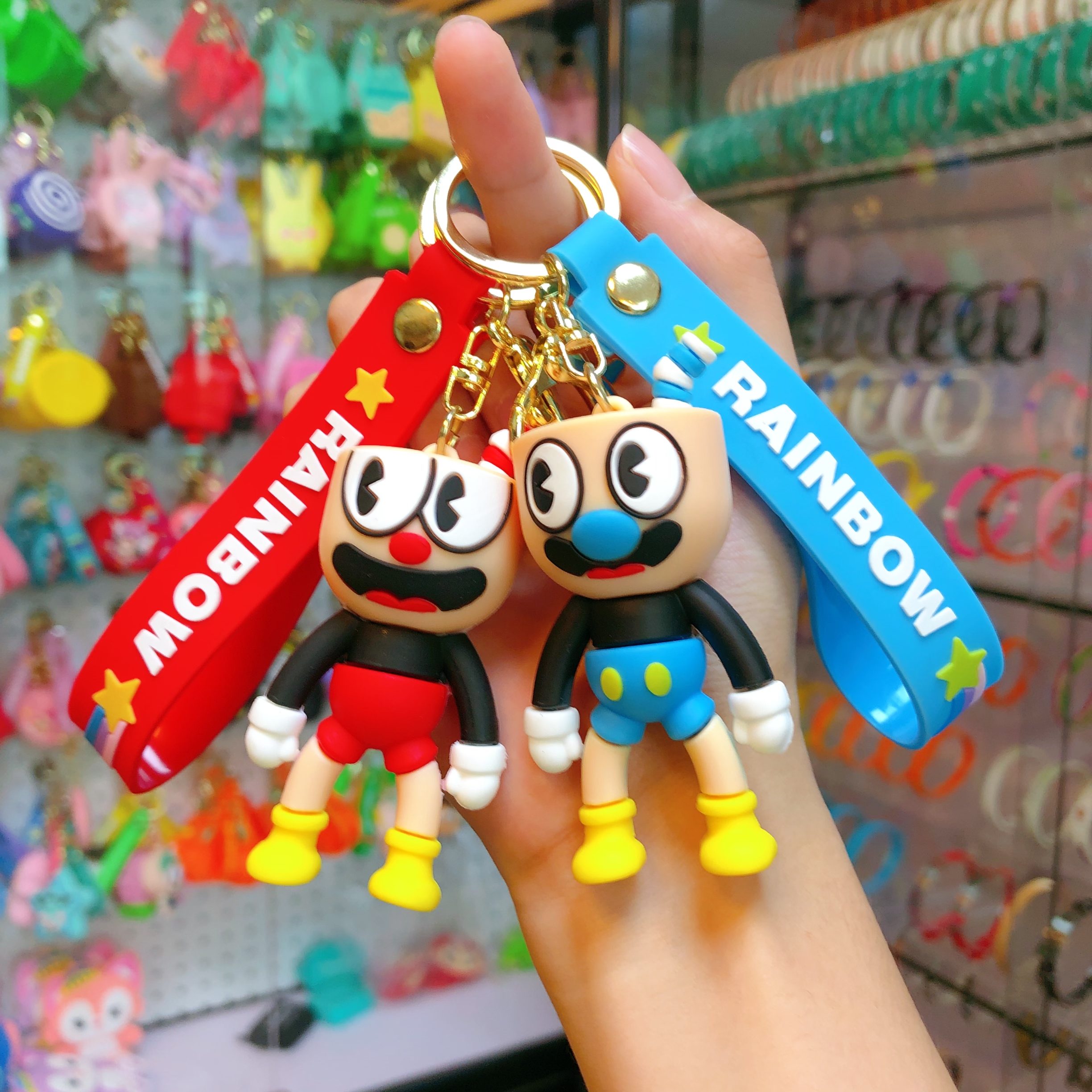 Wholesale of soda water figure keychain figurines, popular key chain accessories, pendants, creative and cute car schoolbags details Picture